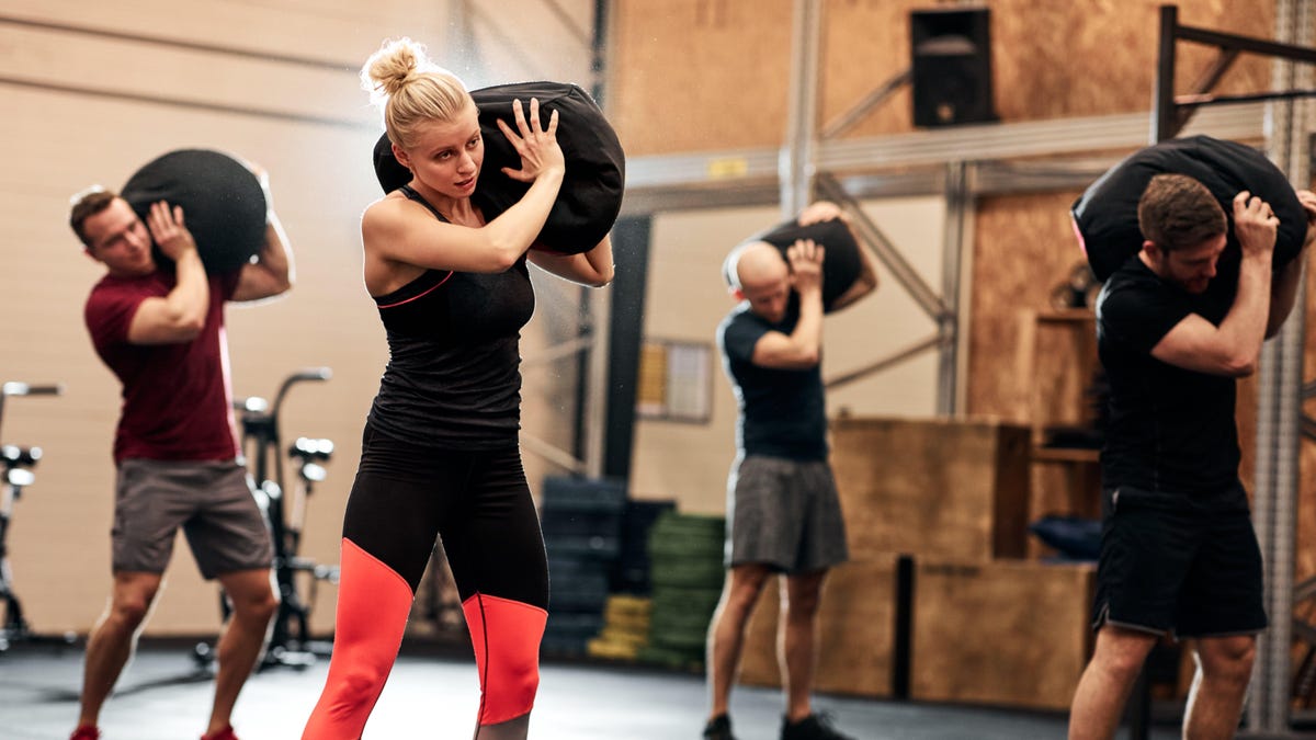 53337C298992F7Ff8823Be7Fee3F54B3 The 10 Best Sandbag Exercises To Try At The Gym