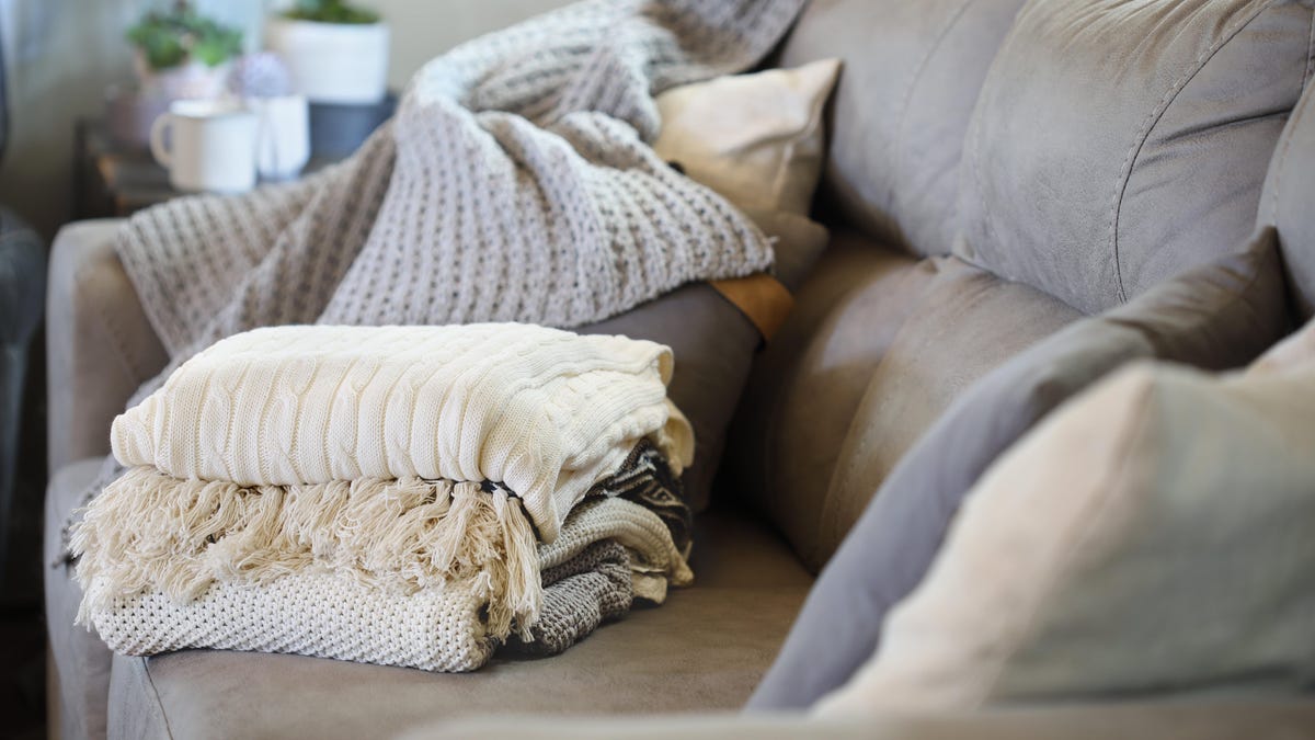 Store Blankets by Turning Them Into 'Pillows'