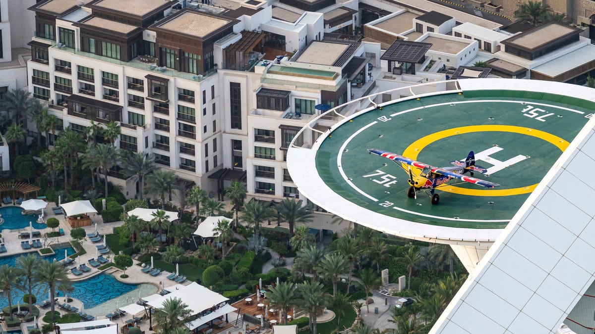 Stunt Pilot Lands Airplane on the World's Shortest Runway, a Helipad
