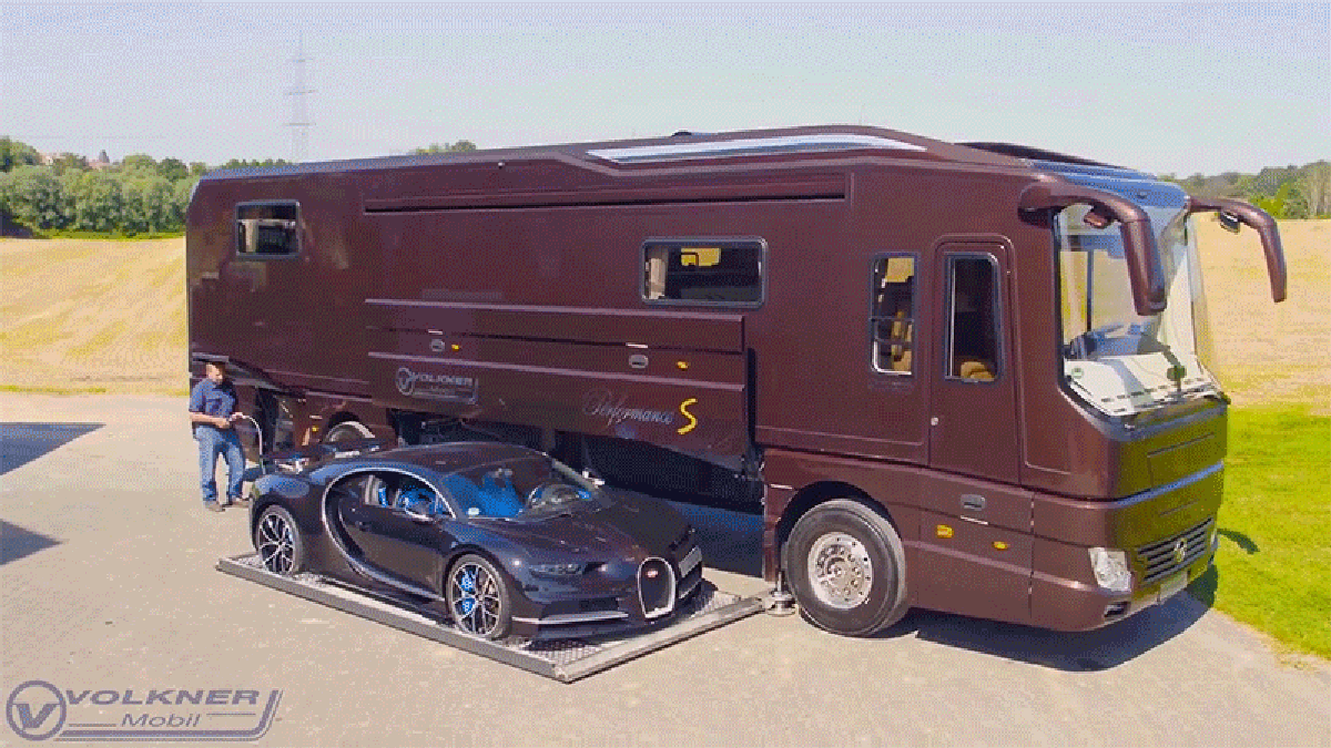 This Obscene Motorhome Includes a Slide Out Garage for a $3 Million Bugatti Chir..