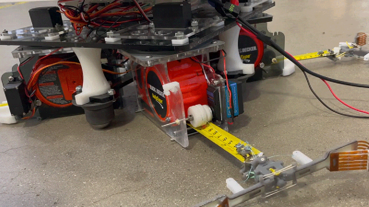 This Robot Uses Tape Measures Like Spider-Man Uses Webs