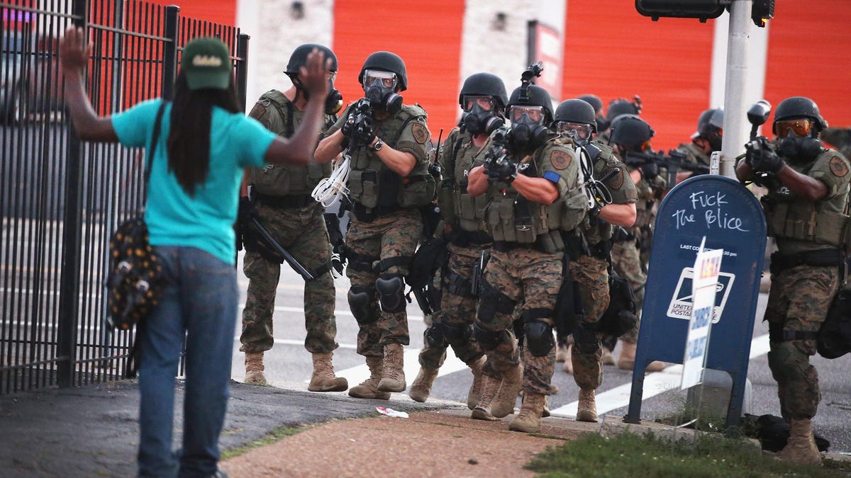 photo of Elon Musk Tweets Defense of Cop Who Killed Unarmed Black Man in Ferguson, Missouri image