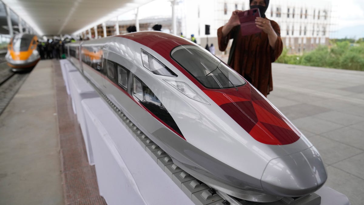 Chinese Premier Li Qianq takes a test ride on Indonesia's new high-speed railway
