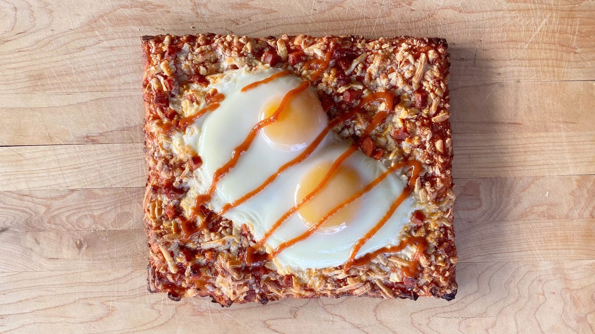 The Case for Putting Expensive Eggs on Cheap Pizza