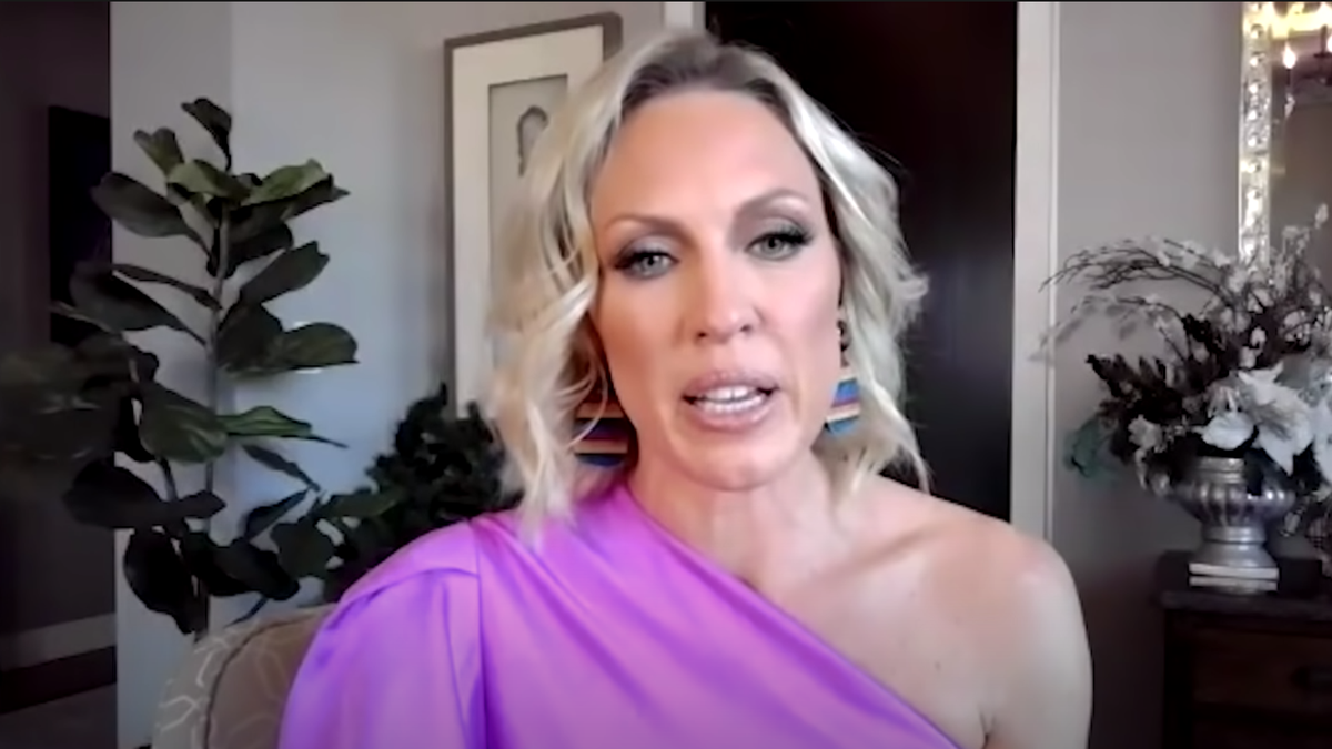 Former RHOC Star Braunwyn Windham-Burke Claims She Was Sued For Kissing Her Co-Star picture photo