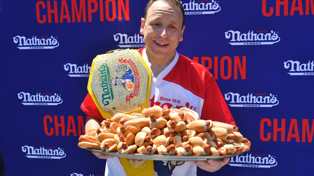 Joey Chestnut takes break to choke protestor en route to another hot dog contest..