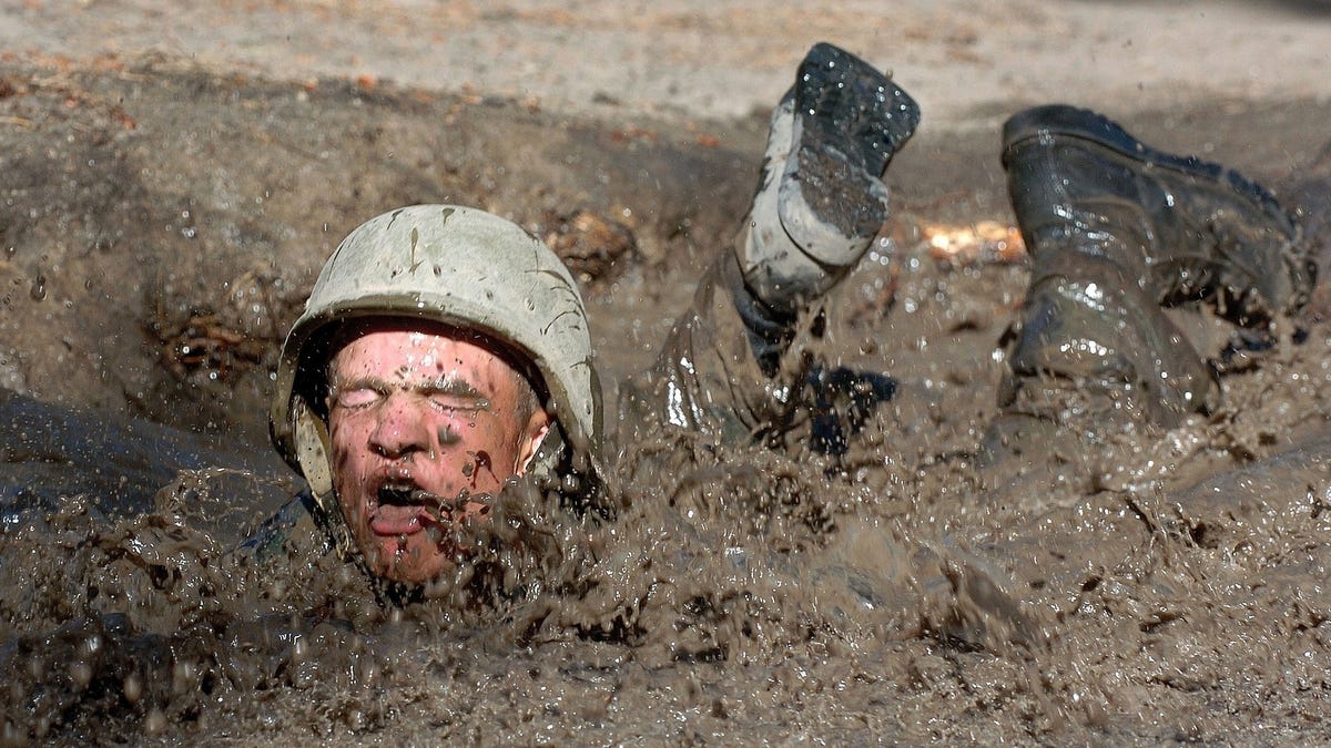 small boy get stuck in quicksand