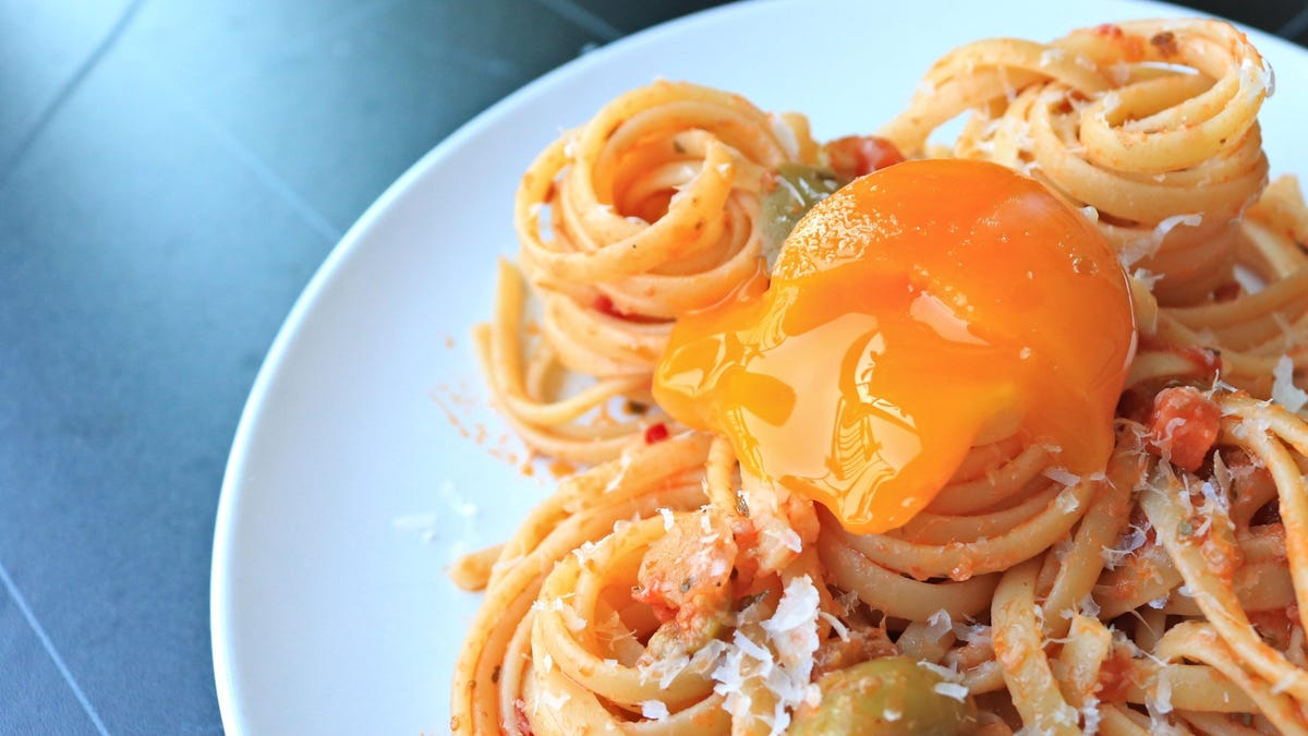 Confit Egg Yolks in Olive Oil and Put Them on Everything