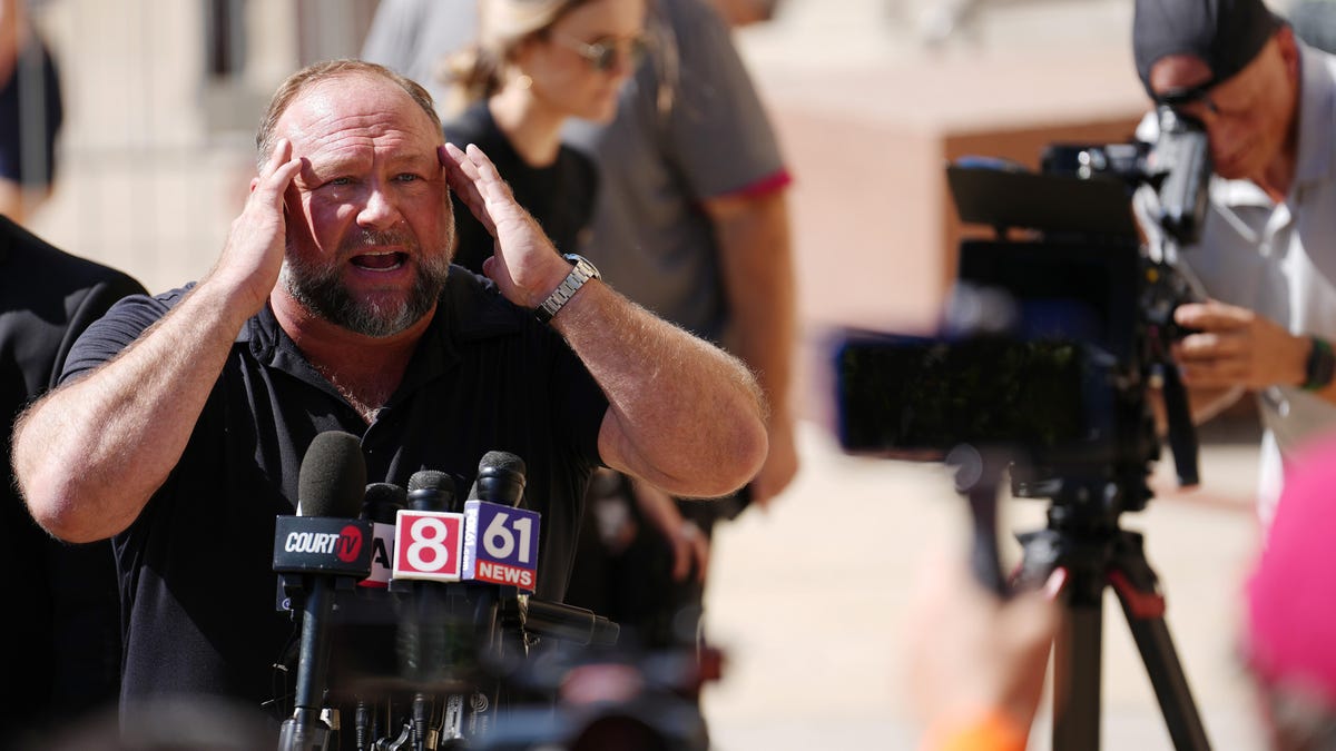 Alex Jones Hit With Nearly $1 Billion in Damages for Lies About Sandy Hook Victi..