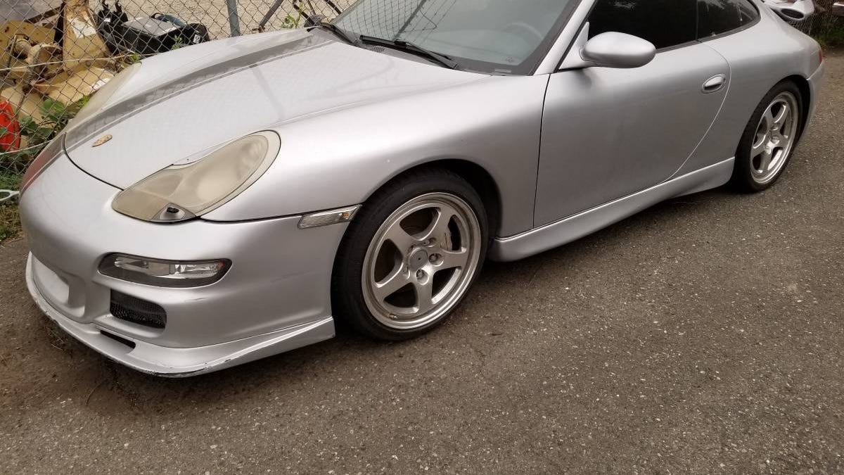 At $10,000, Could This Fire-Damaged 1999 Porsche 911 Carrera 4 Be A Smoking  Hot Deal?