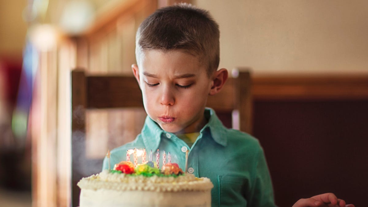 Weird Birthday Boy Blowing Out Candles Wishes For John Hickenlooper To