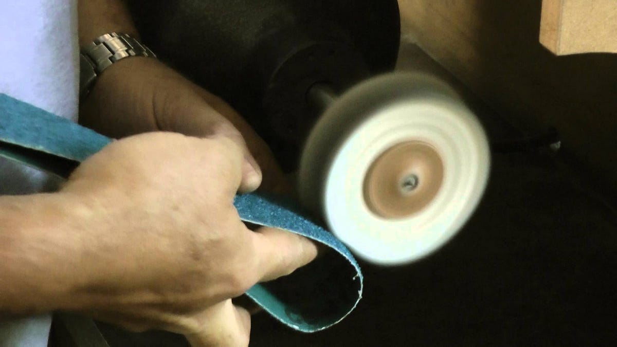 Clean A Dirty Buffing Wheel In Seconds With A Sanding Belt