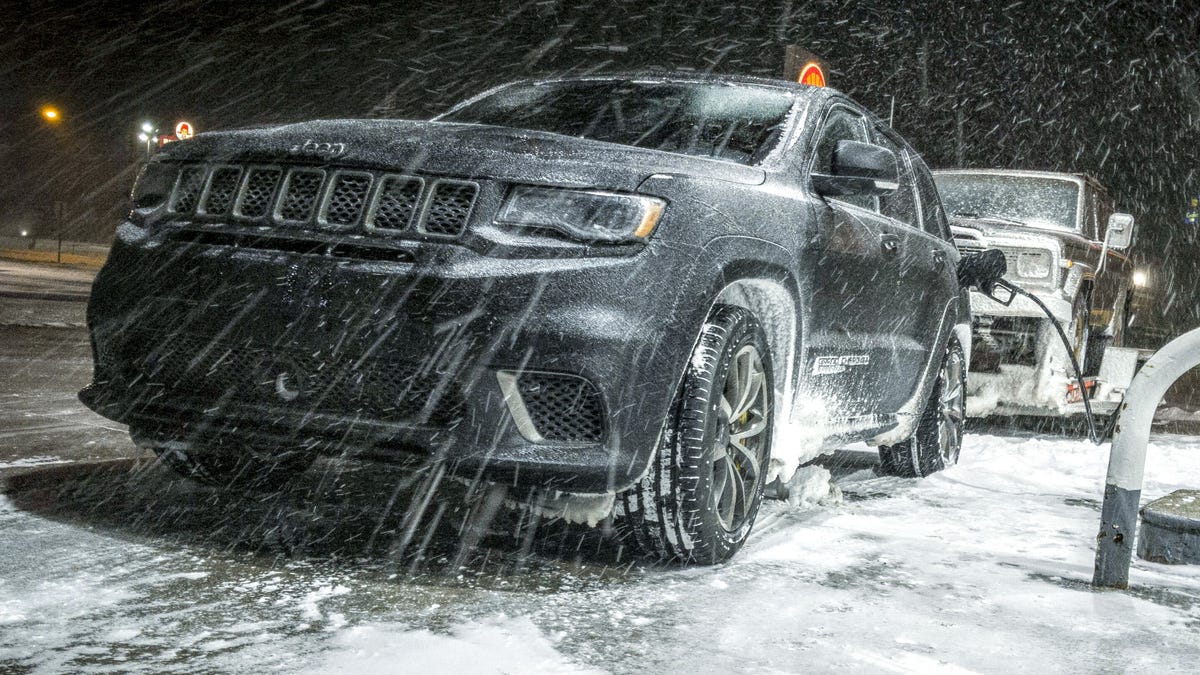 Towing An Old Jeep Through An Ice Storm With A 707 Hp Jeep Grand