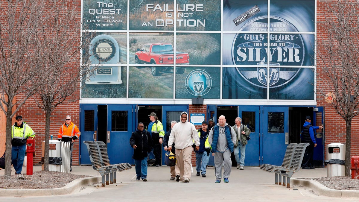 Detroit car workers fit for COVID-19 vaccine