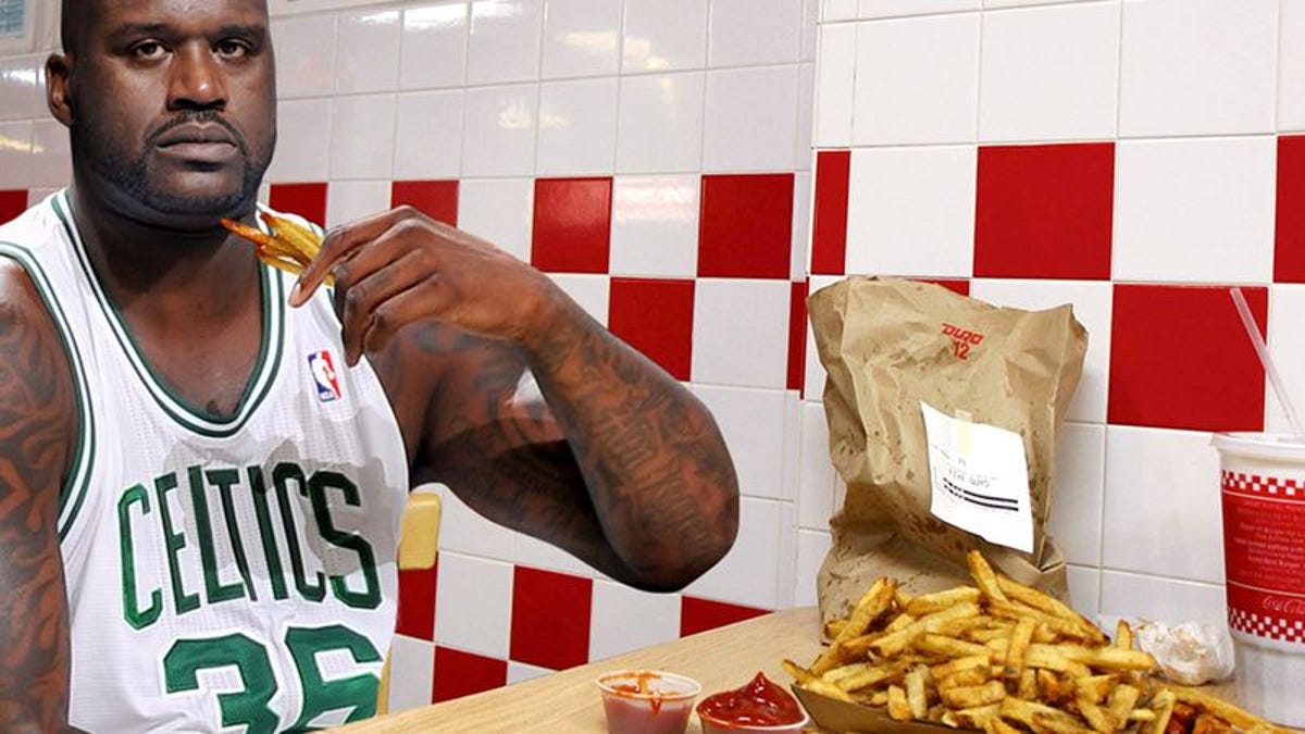 Shaq Shows He Can Still Dominate Around Basket Of Fries.