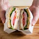 illusztráció a cikkhez a szendvics csomagolásának legjobb módja útközben történő étkezéshez