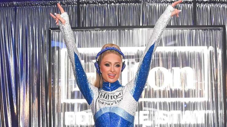 Image for Paris Hilton Is Photographed Vacationing on Maui Beach Near Wildfire Devastation