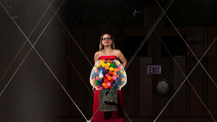 Image for Kyrsten Sinema Descends To Senate Floor On Floating Platform Wearing Dress Shaped Like Gumball Machine