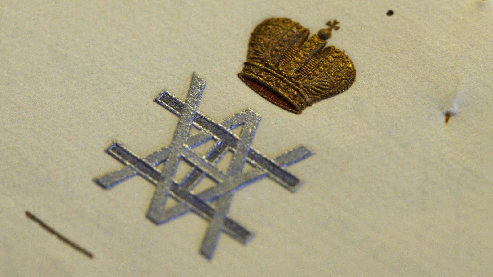 Two letters with the Emperor arms, signed by Tsar Nicholas II are displayed during an auction preview in Rougemont, 150 km (93.2 miles) east of Geneva, November 29, 2012. Prince Nicolas Romanov of Russia is putting some 3000 items, including many photographs and letters of the last Tsar Nicholas II, for sale during an auction in Geneva December 10 to 13, 2012. REUTERS/Denis Balibouse (SWITZERLAND – Tags: SOCIETY ROYALS) – BM2E8BT13FT01