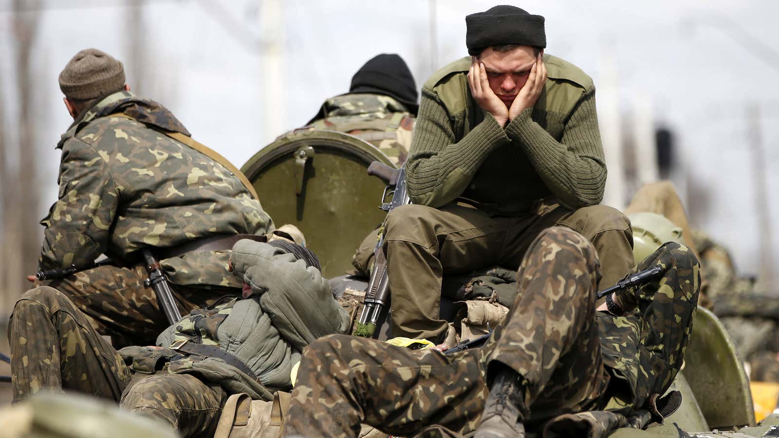 Ukrainian soldiers await orders in the eastern city of Kramatorsk.