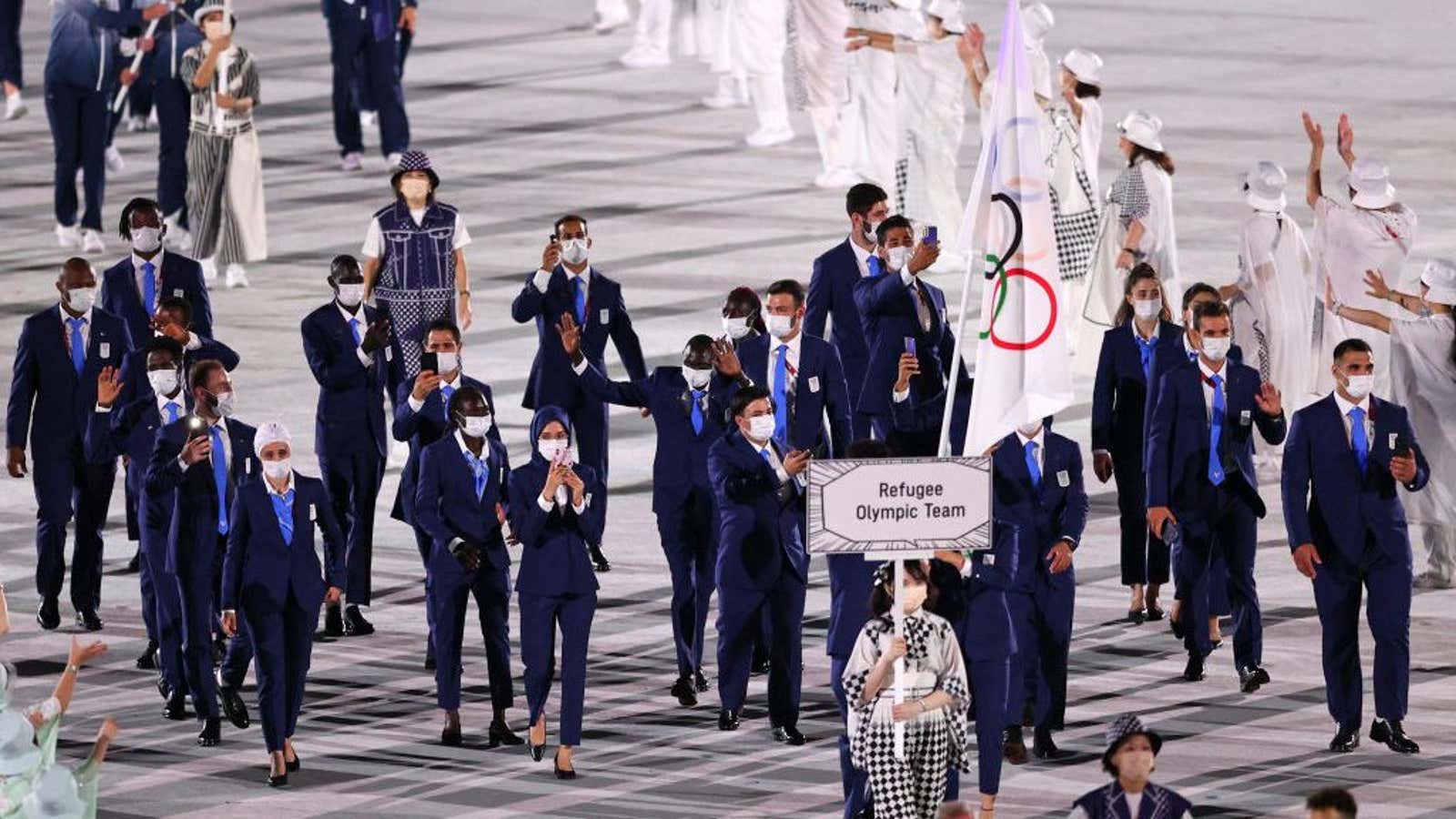 Flag bearers Yusra Mardini and Tachlowini Gabriyesos of The Refugee Olympic Team during the Opening Ceremony of the Tokyo 2020 Olympic Games at Olympic Stadiumâ€¦