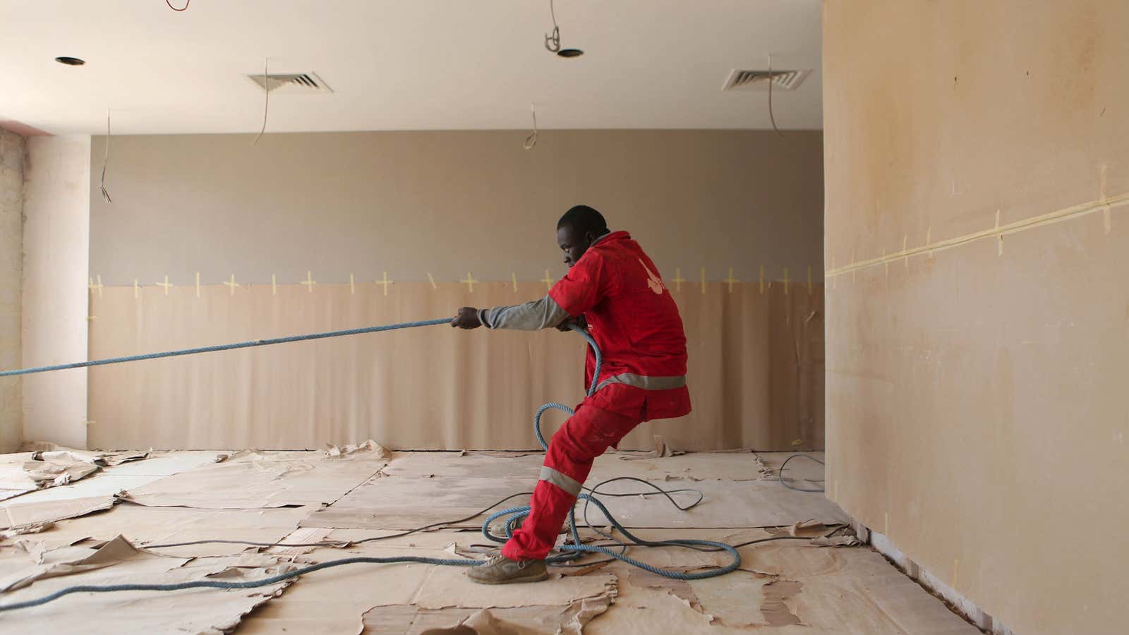 A worker at the construction site for the Radisson hotel, being built in the Ivory Coast’s economic capital, Abidjan.