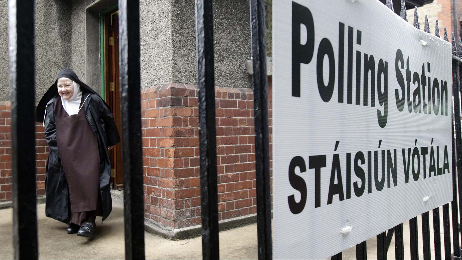 A nun exits a polling station in Dublin.
