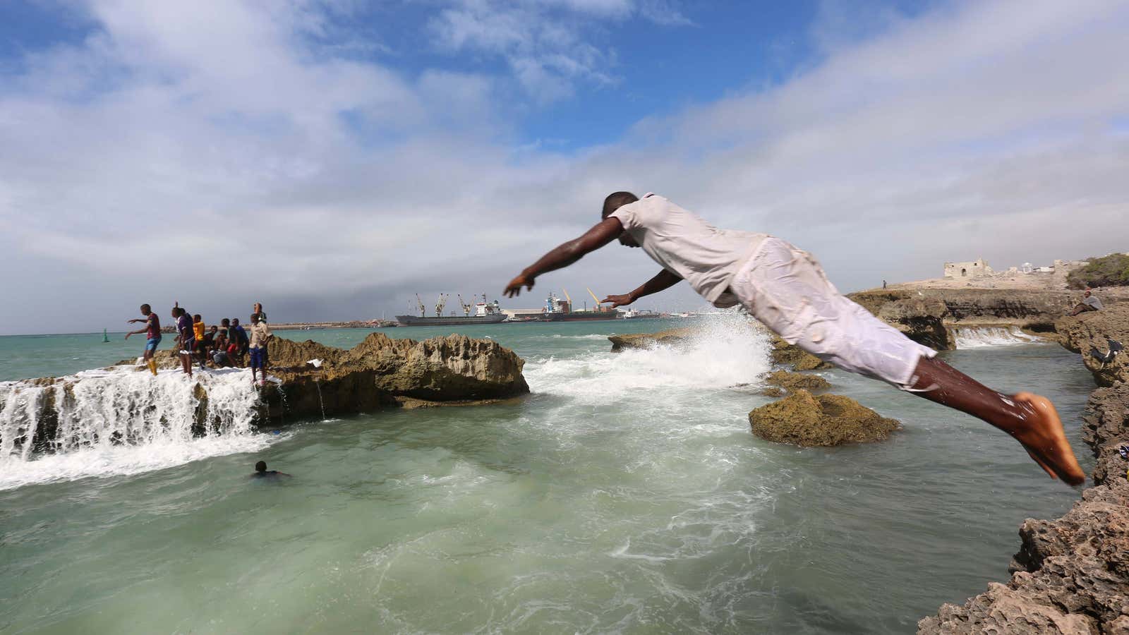 Diving into the Indian Ocean waters at Lido beach in Mogadishu.
