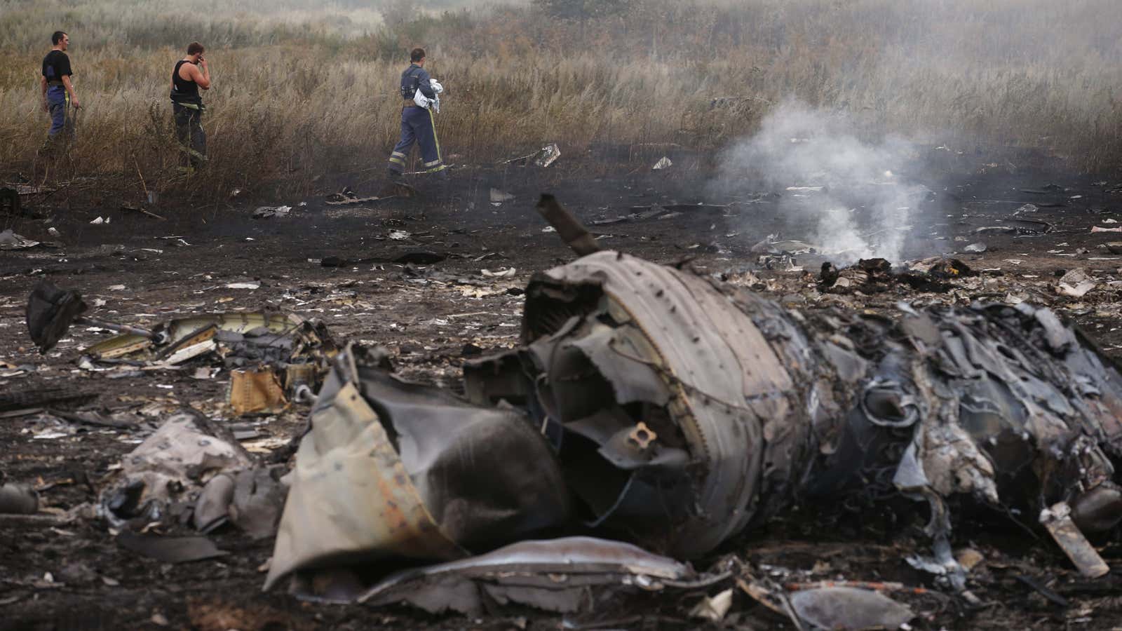 Emergency responders at the crash site of Malaysian Airlines flight 17.