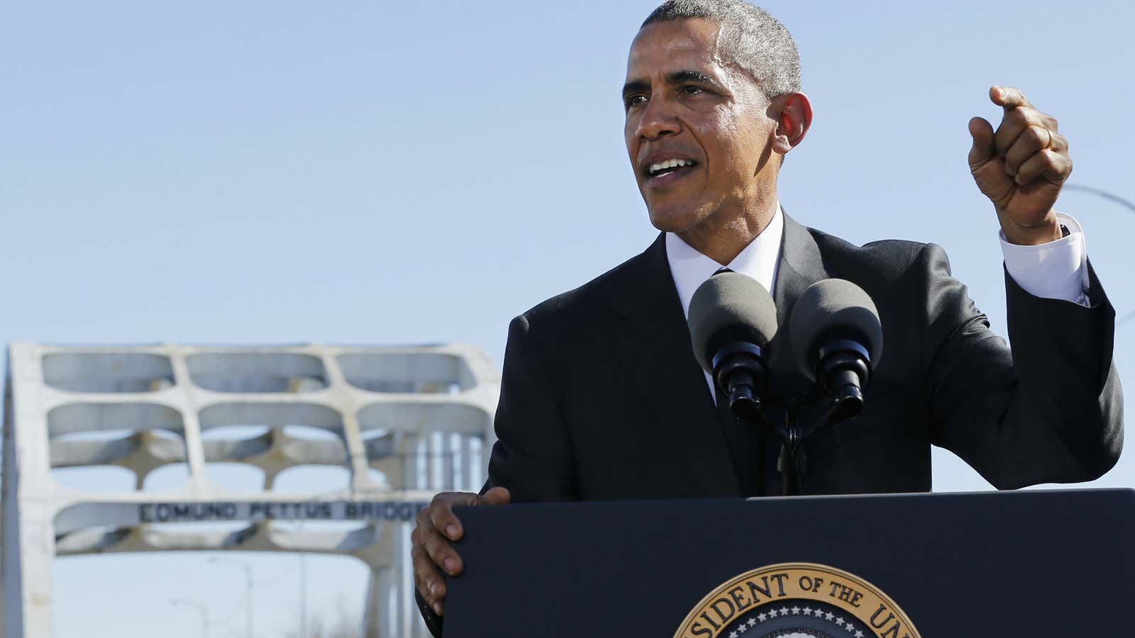 Obama speaks in front of the Edmund Pettus Bridge.