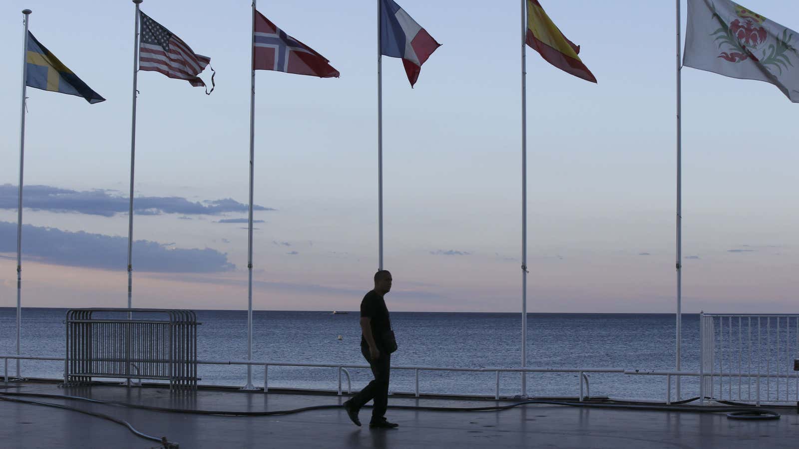 Flags near the scene of the attack in Nice, France.