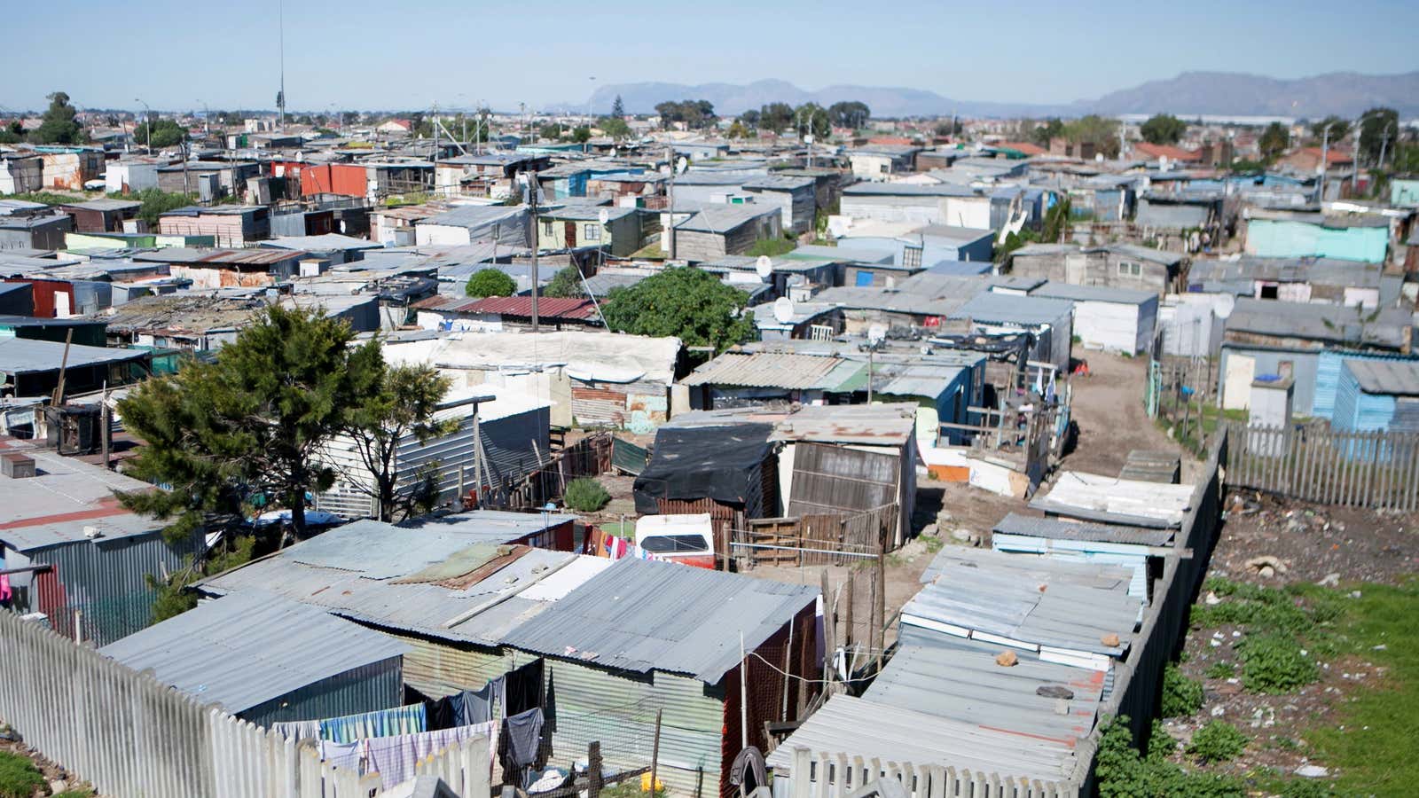 Shacks are seen at an informal settlement near Cape Town, South Africa.