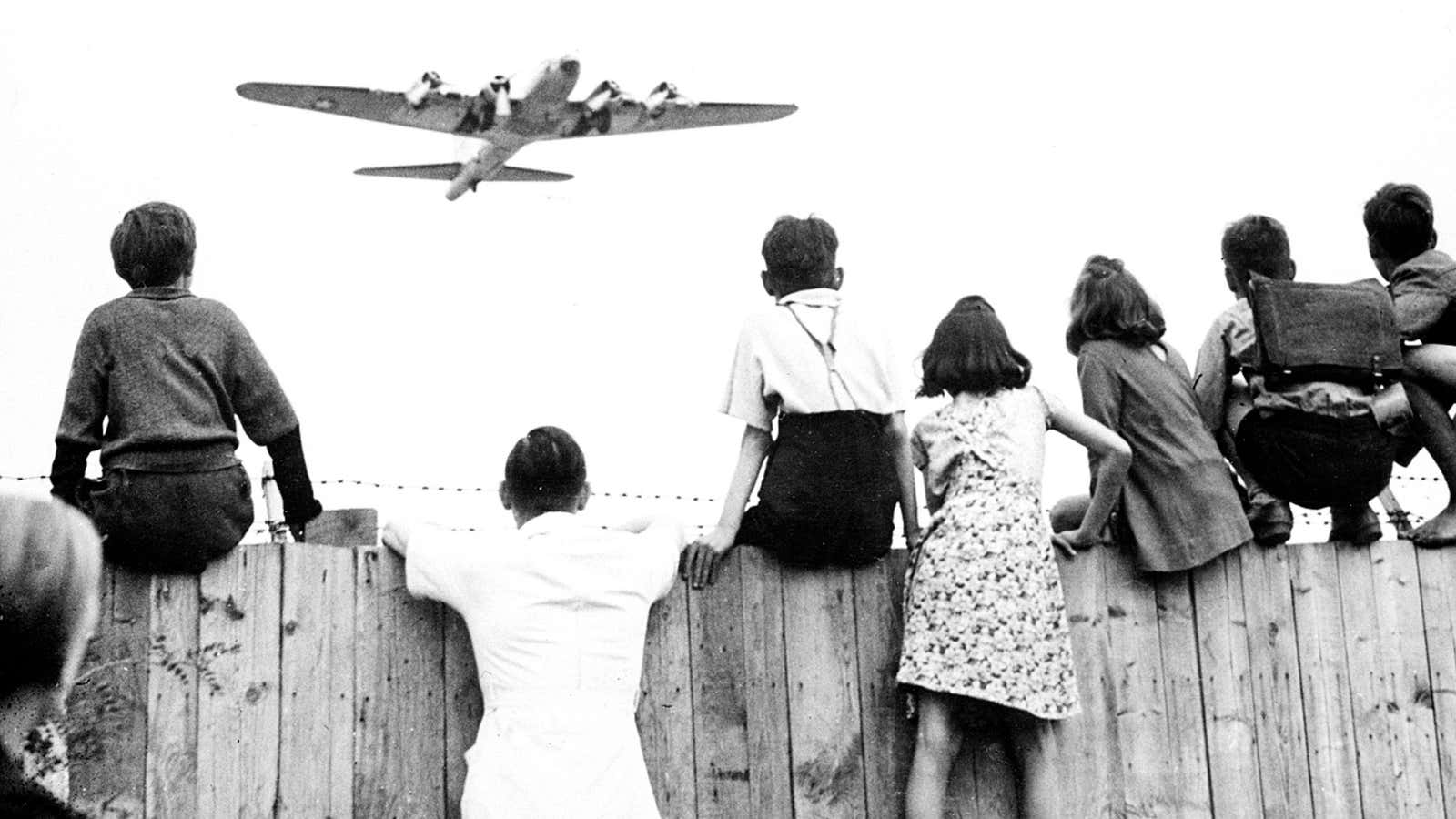 West German kids wait for the US planes to drop candies.