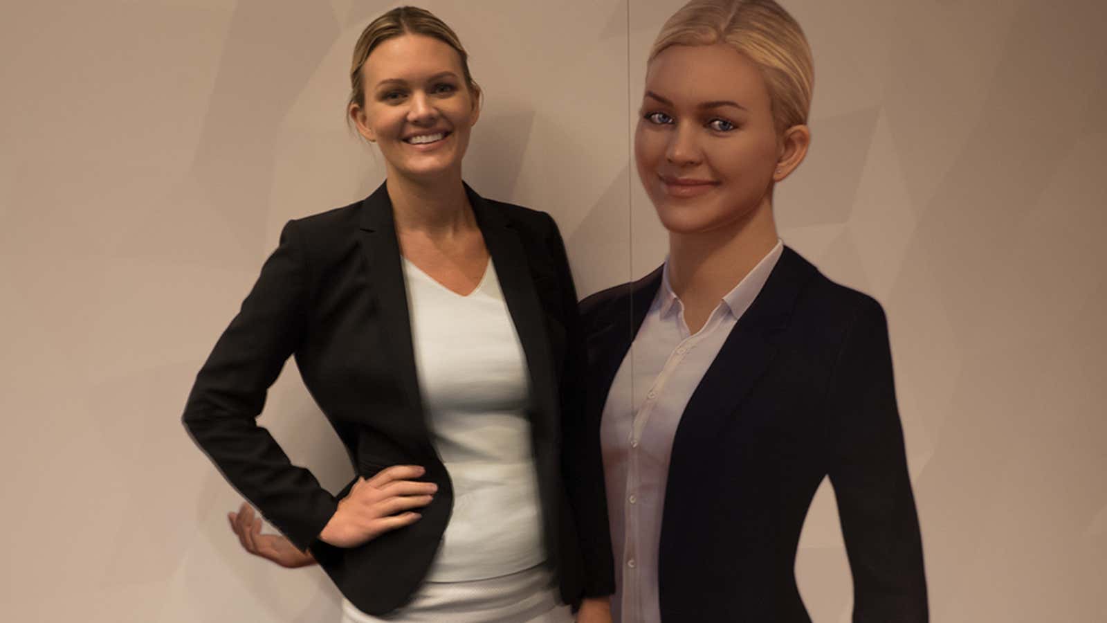 The avatar for AI technology Amelia (right) is based on Lauren Hayes (left).