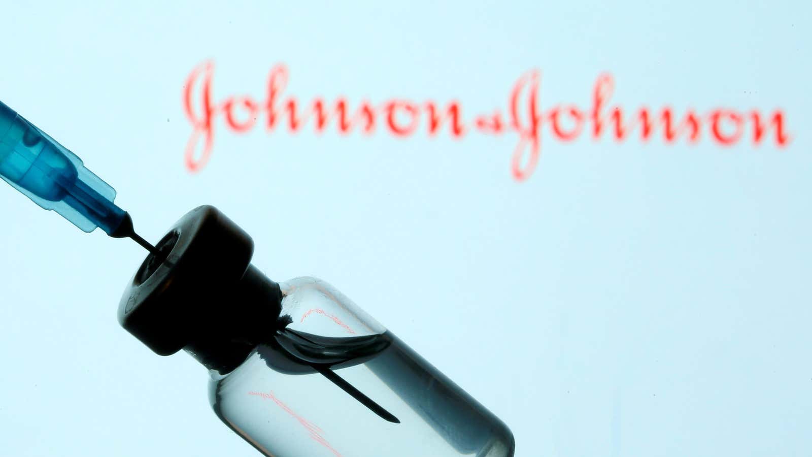 FILE PHOTO: A vial and sryinge are seen in front of a displayed Johnson&amp;Johnson logo in this illustration taken January 11, 2021. REUTERS/Dado Ruvic/Illustration/File Photo