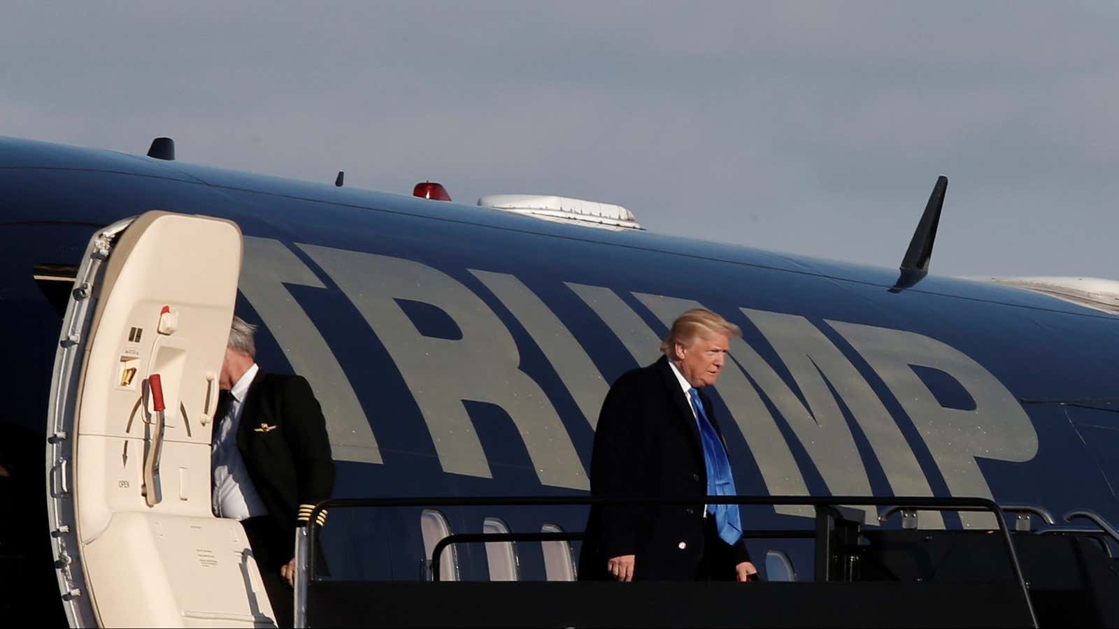 U.S. President-elect Donald Trump departs his plane as he arrives in Baltimore, Maryland, U.S. to attend the Army vs Navy college football game at M&amp;T…