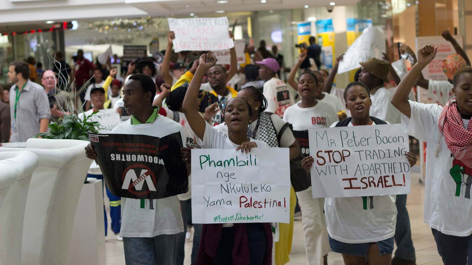 Protestors in Johannesburg call for a boycott of Woolworths supermarket.