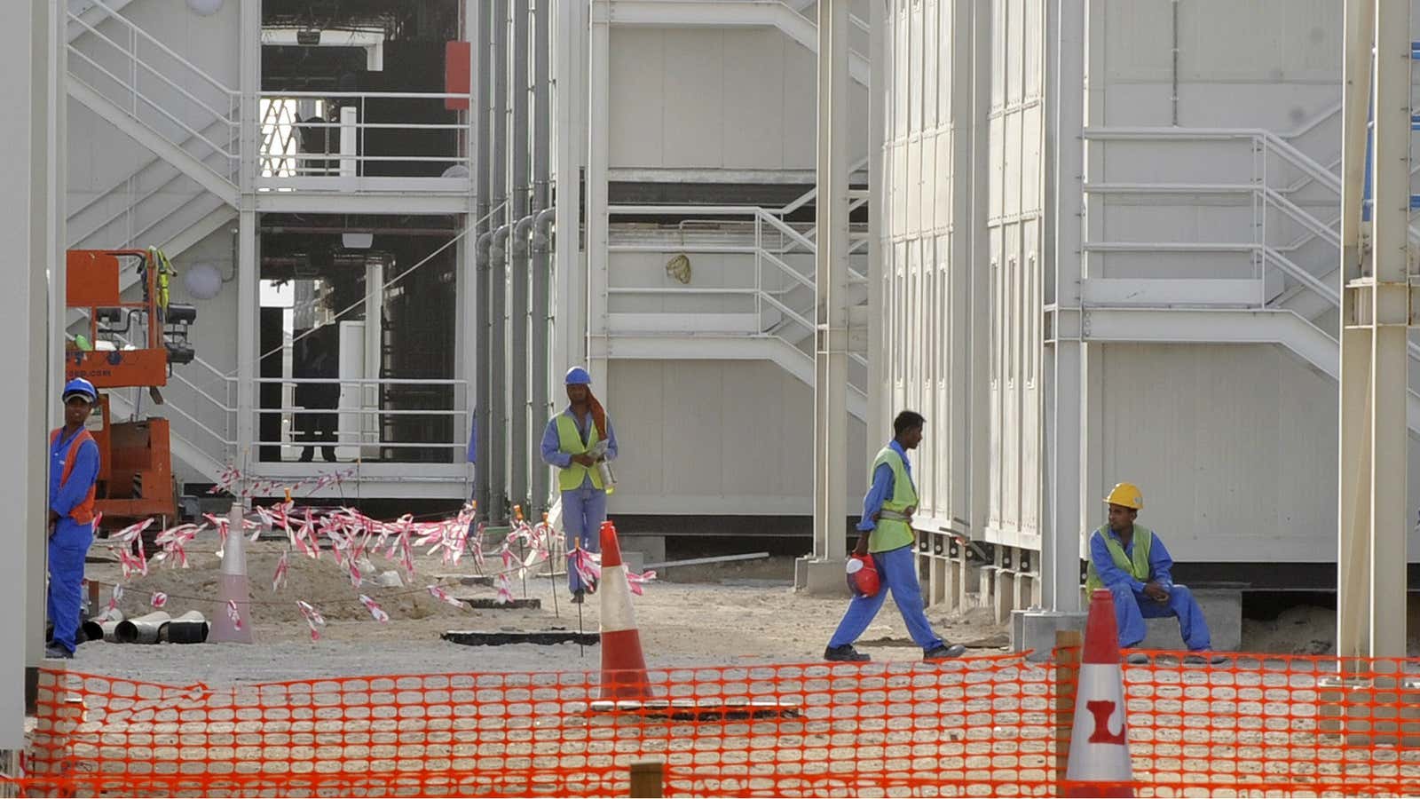 Laborers work on a housing village for construction workers on Saadiyat Island.