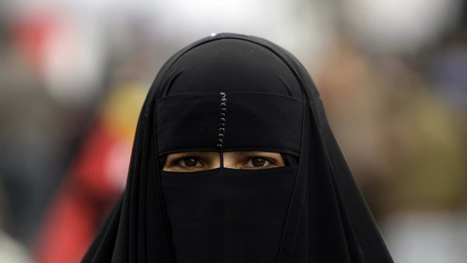An Egyptian woman wears a niqab at Tahrir Square in Cairo.
