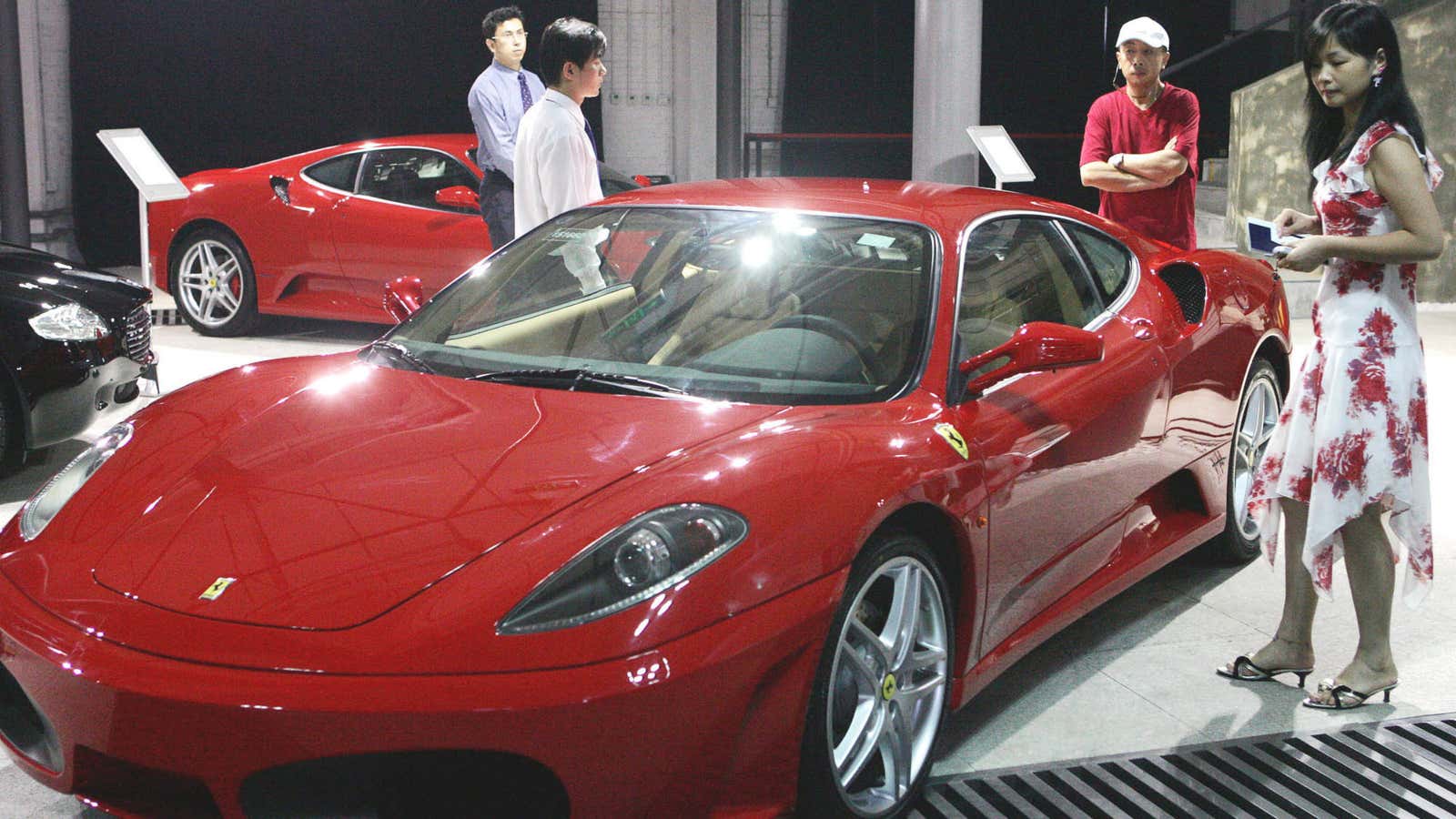 A Ferrari at an auto show in Beijing. Is too much bling and corruption among politicians hurting investor confidence?