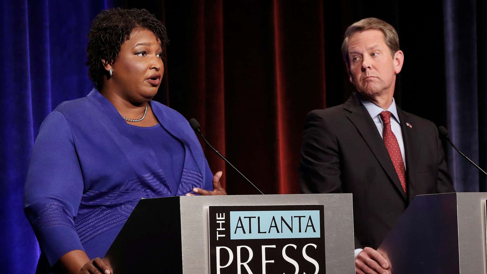 Democratic gubernatorial candidate for Georgia Stacey Abrams, right, and her GOP rival, Brian Kemp, ahead of the election.