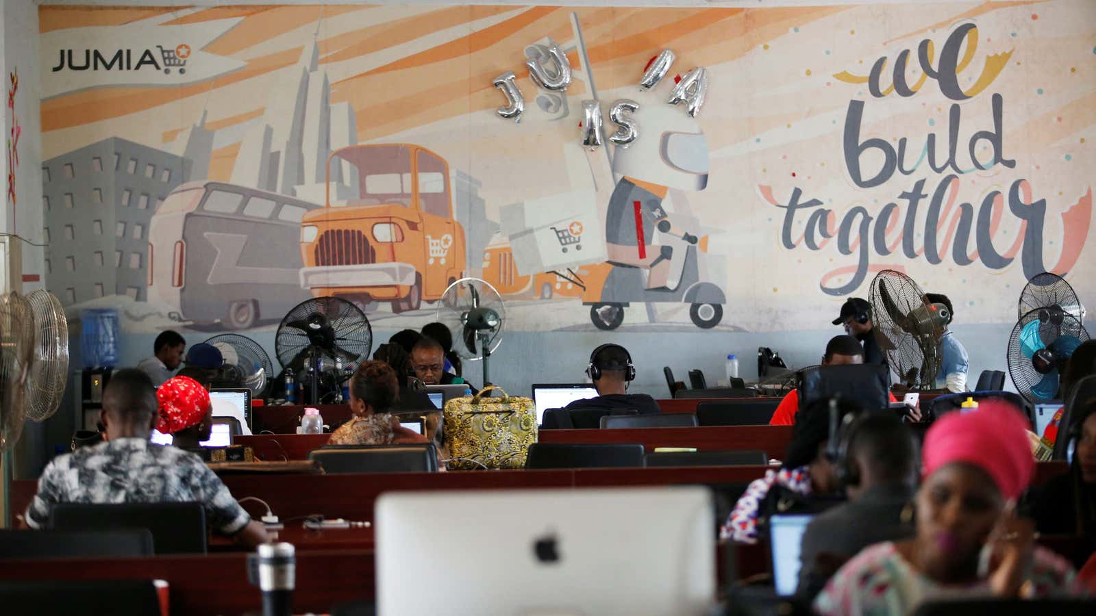 People work on computers at the online store Jumia in Lagos.