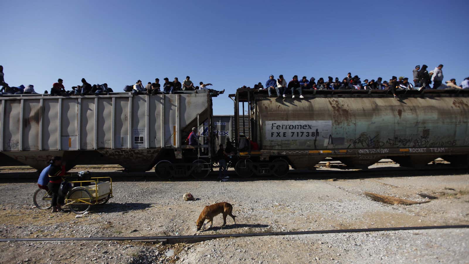 Central American migrants ride on a train in the Mexico’s southern state of Chiapas.