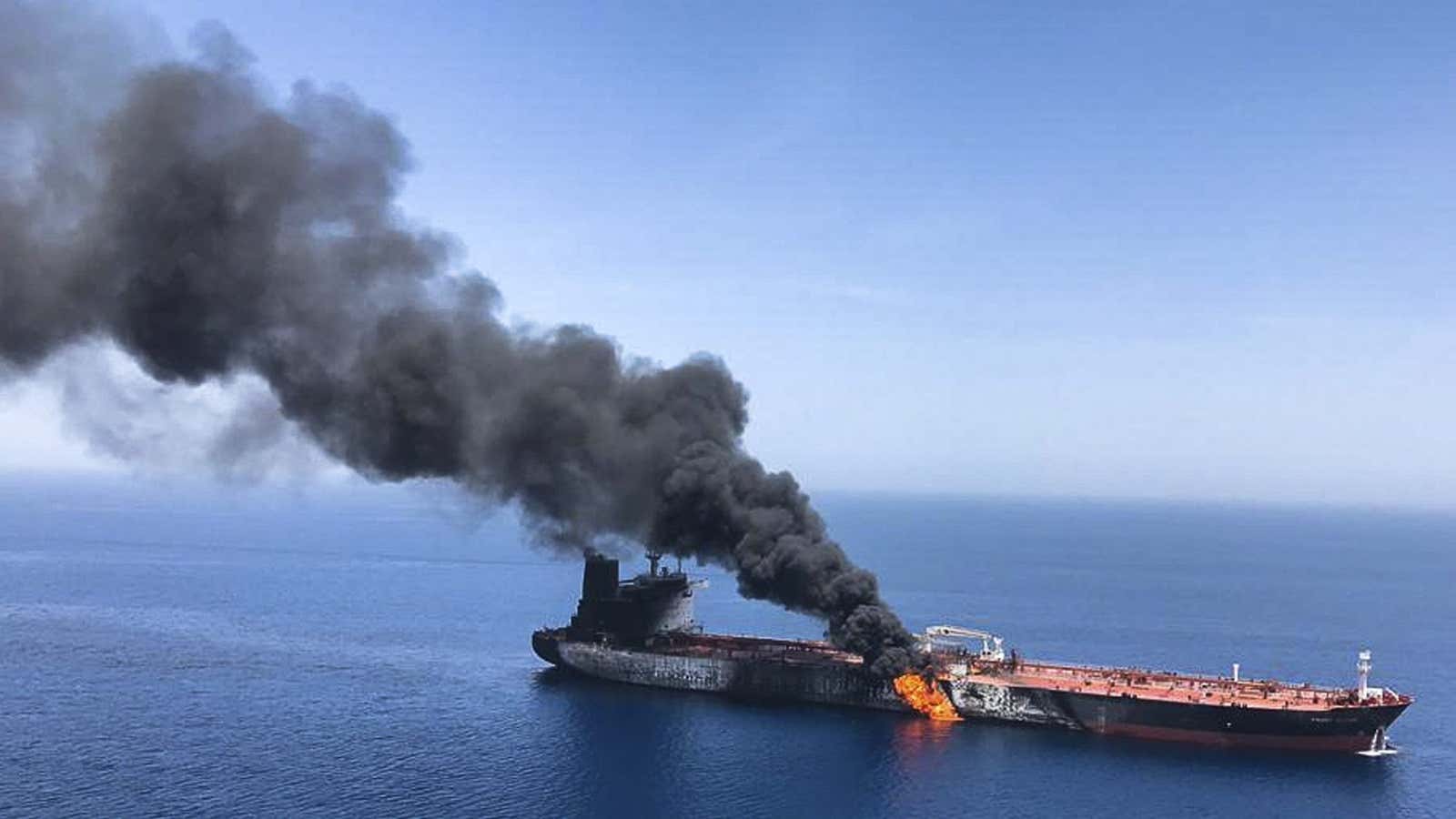 An oil tanker flamed in the sea of Oman, following reported attacks on two ships in the Persian gulf.