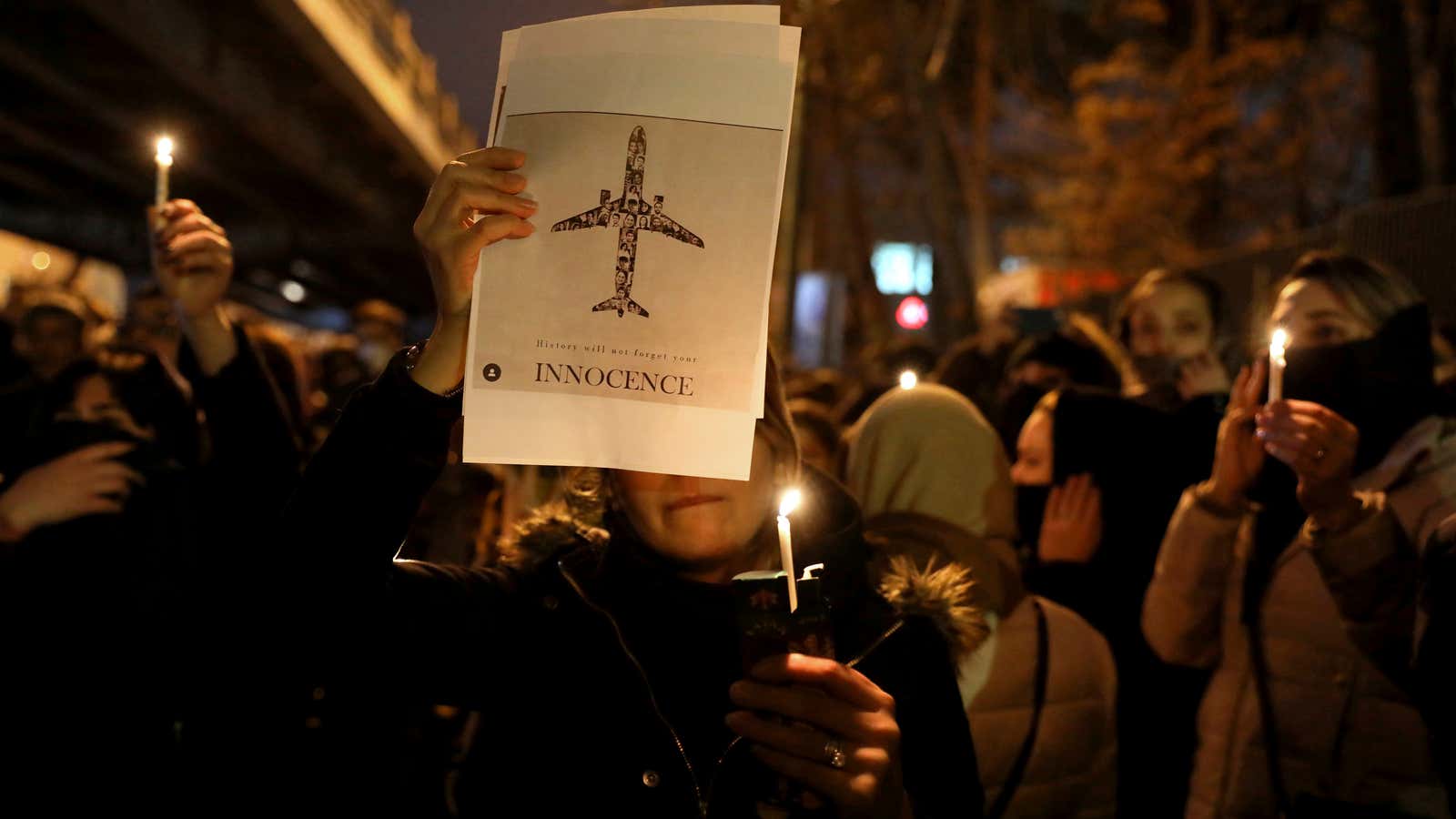 A candlelight vigil for the victims of the Ukraine plane crash at the gate of Amri Kabir University in Tehran.