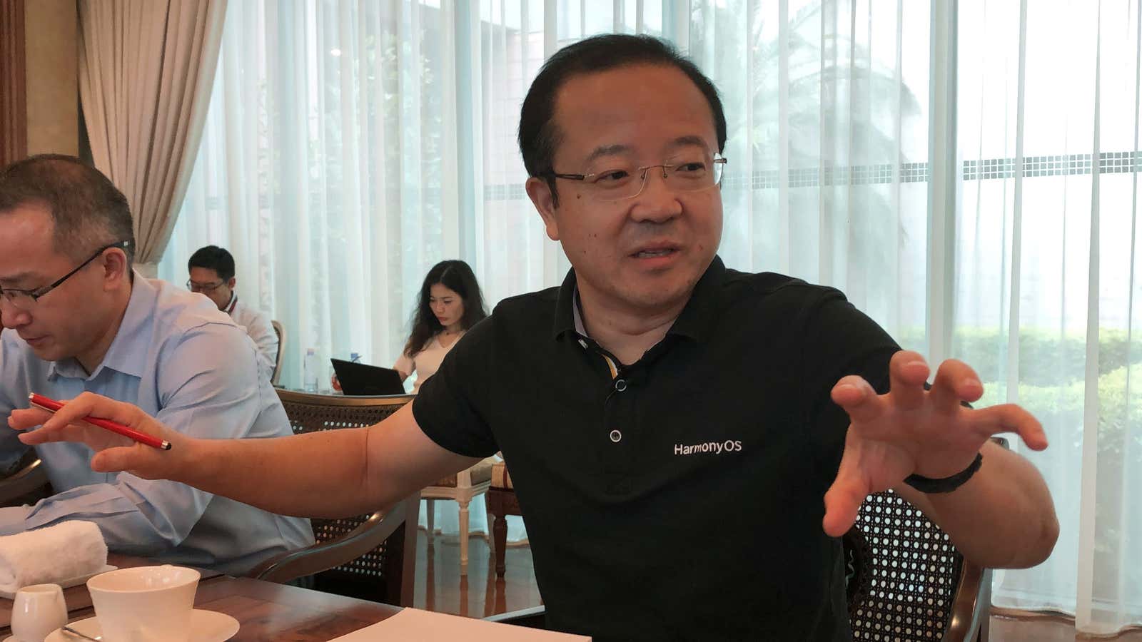 Wang Chenglu, president of Huawei Consumer Business Group’s Software Department, talks about the HarmonyOS operating system during a media roundtable at the Huawei headquarters in…