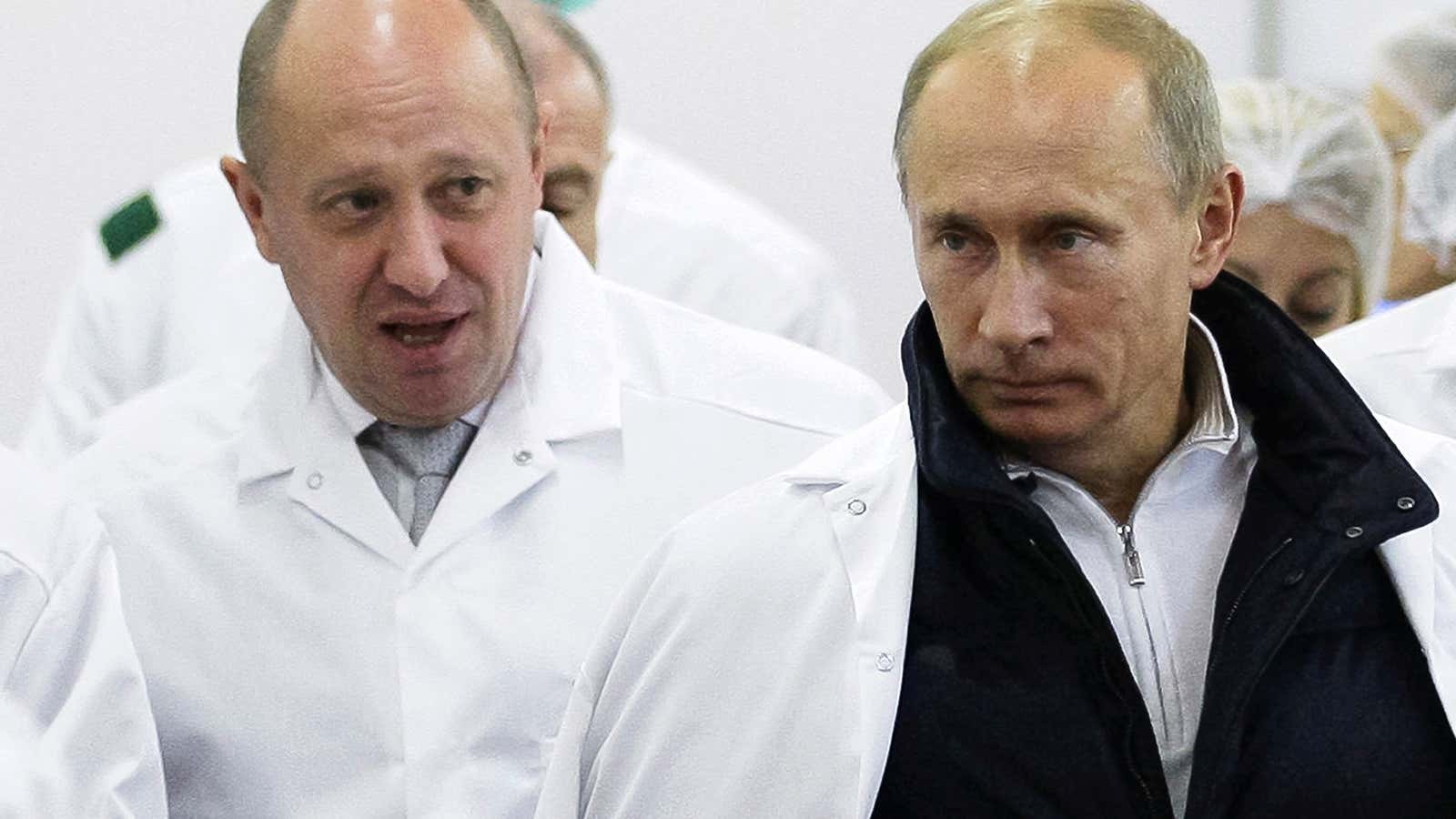 Yevgeny Prigozhin, left, owns the Internet Research Agency, which CNN linked to recent ads seemingly meant to inflame social divisions in the US. He’s shown with Russian President Vladimir Putin in 2010.