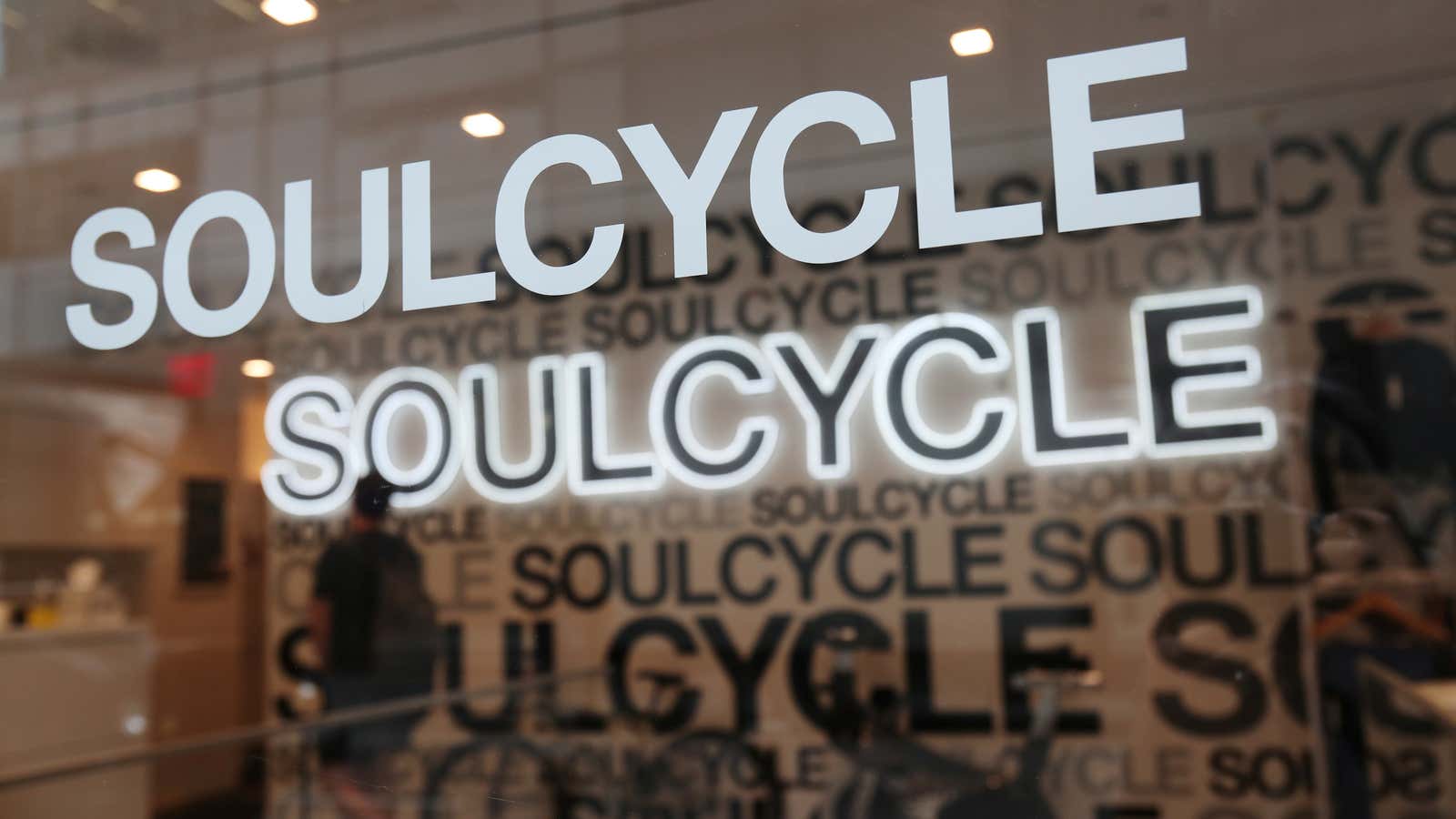 The sign for SoulCycle is seen at the entrance to the fitness chain in New York City, U.S., August 8, 2019.