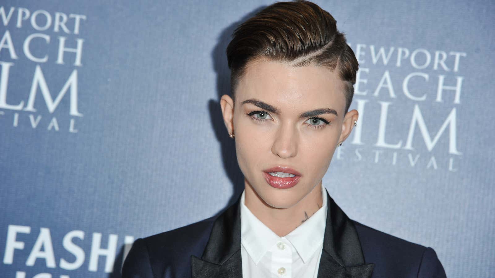 Orange is the New Black’s breakout new star has a message—and a sultry red carpet look.