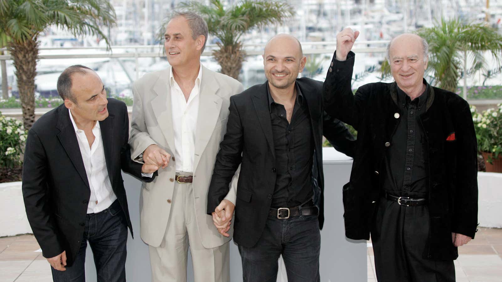 From left, Philippe Val, French director Daniel Leconte, Charlie Hebdo’s lawyer, Richard Malka, and French cartoonist Georges Wolinski at the Cannes Film Festival. Wolinski was killed in yesterday’s attack.